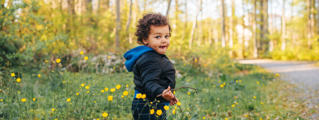 Little boy playing in nature